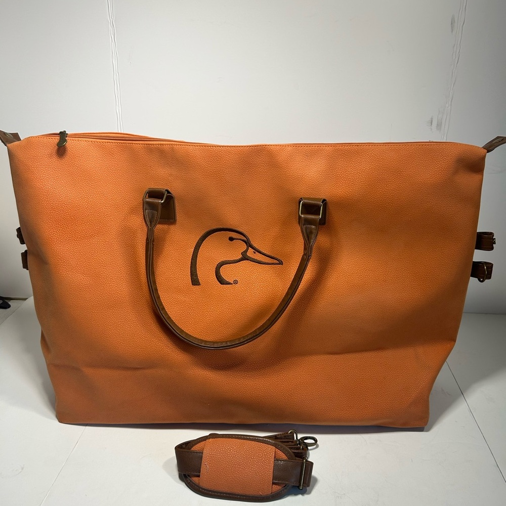 Elegant Orange Duffel Bag with Duck Emblem - Picture 3 of 11